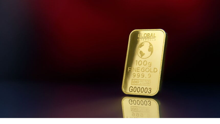 Bild mit einem aufrechtstehendem Goldbarren